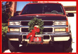 truck-wreath-txt.jpg (92401 bytes)